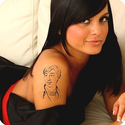 Photo effect - Tattoo on the arm of charming girl